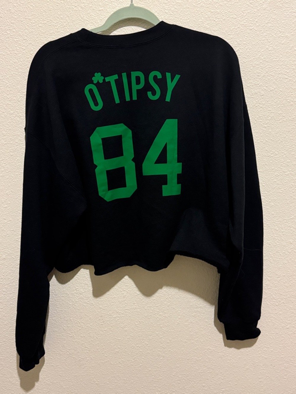 NOBULL Black Cropped Crewneck with Green "O'Tipsy 84" Graphic